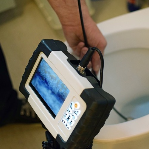 equipment being used for a plumbing inspection