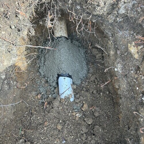 blue sewer line in the ground